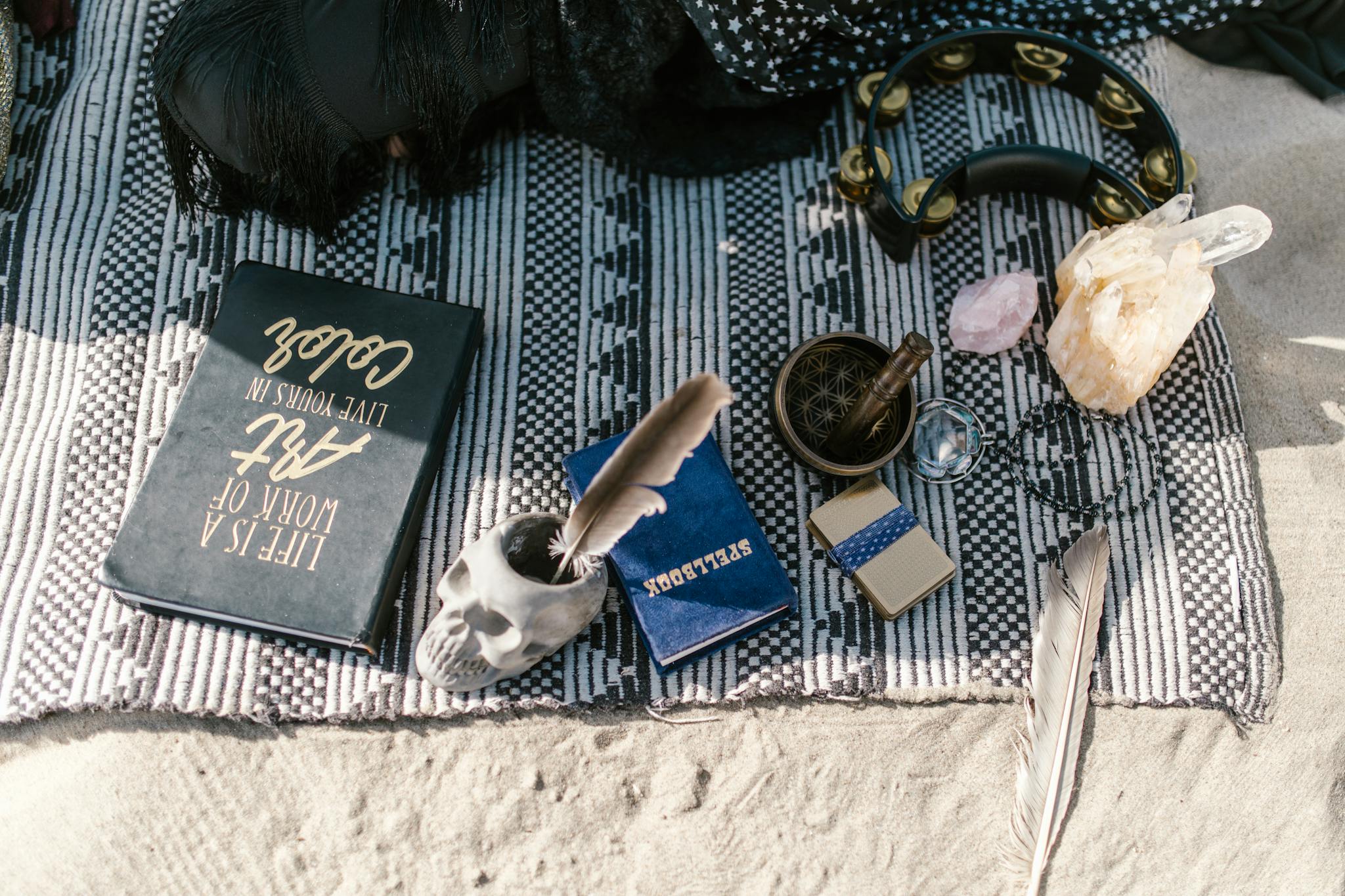flat lay of spiritual tools with crystals